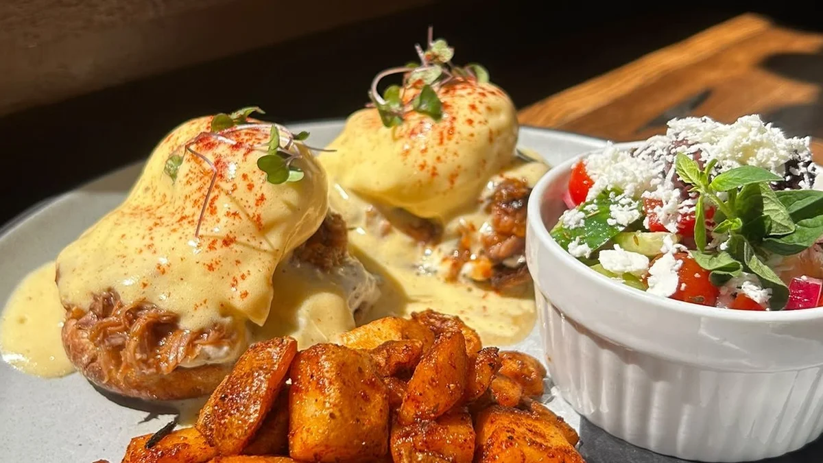 his weekend’s feature takes our classic Eggs Benny in a Mediterranean direction.

Our lamb shanks are baked, then slowly braised with orange and rosemary until beautifully tender and falling from the bone. The lamb is shredded and piled onto a toasted English muffin with tzatziki, topped with two poached eggs and our house-made hollandaise.

Served with a fresh Greek salad and crispy hash browns for a seriously satisfying weekend breakfast.

If you’re looking for something a little different for brunch in Squamish, this one is worth getting out of bed for.

Available this weekend only.